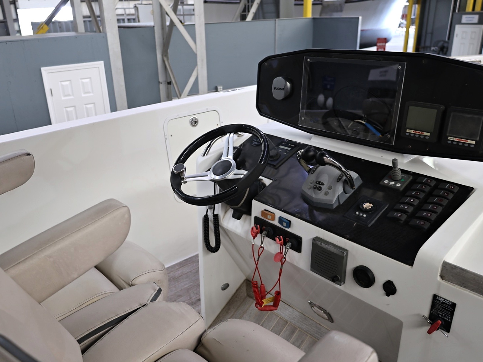 Le Ti's helm station with steering wheel, controls and engine display positions